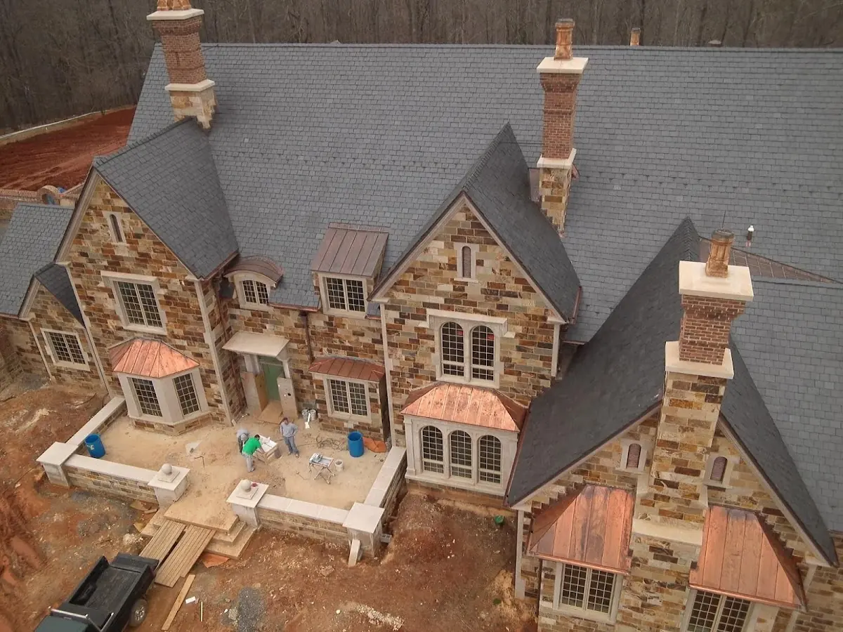 Craftsman Roofing Slate Roof Repair project in Civic Center